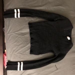 Black cropped sweater with white stripes